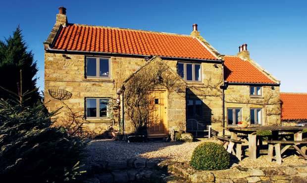 Repair-roof-Extended_stone_coastal_cottage