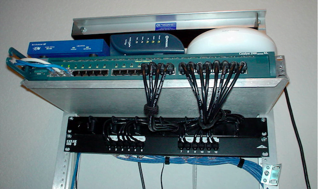 Firewall, Cable Modem, Wireless Access Point, 24 port managed 100 megabit switch, cable management and patch panel.