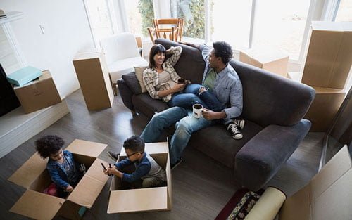 Moving-boxes-family-living-room_featured