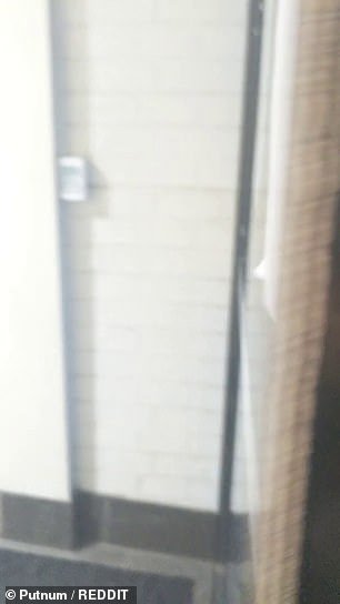 The code slides away behind the other piece of glass, leaving Reddit users bemused at the hilarity of the placement