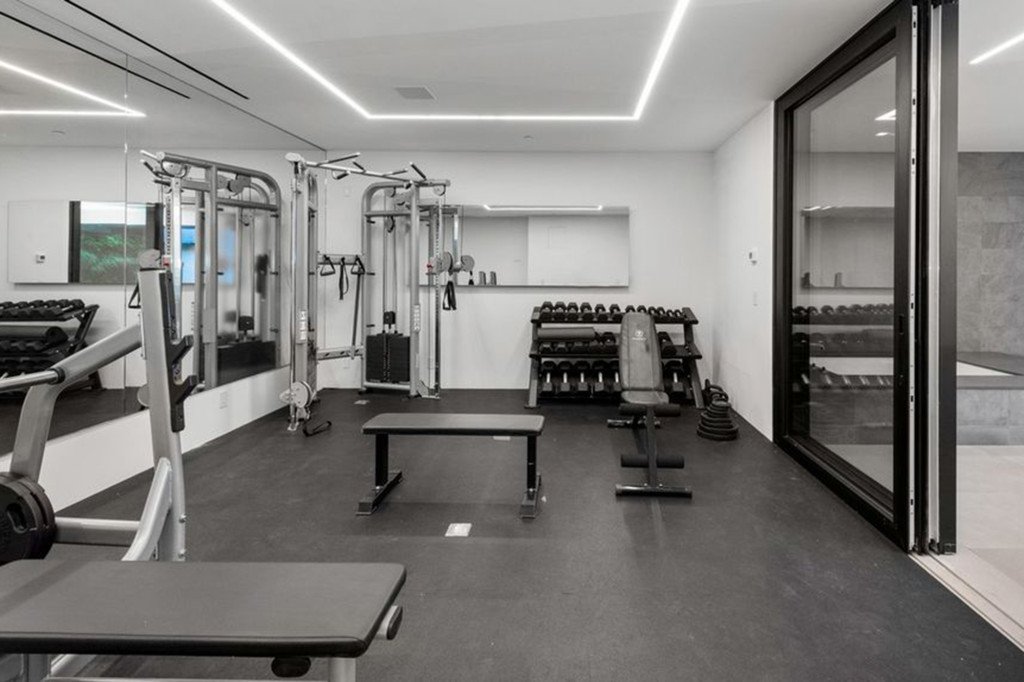 The lower level has a spa, gym, indoor pool and living wall, according to the listing. 