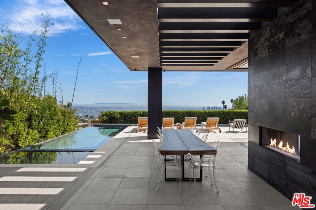 The house offers a lap pool, spa and infinity pool.