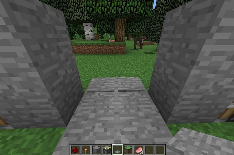 How to make an automatic door in Minecraft 3 Sticky piston doors are somewhat more complex than the standard pressure plate door (Image via Mojang)