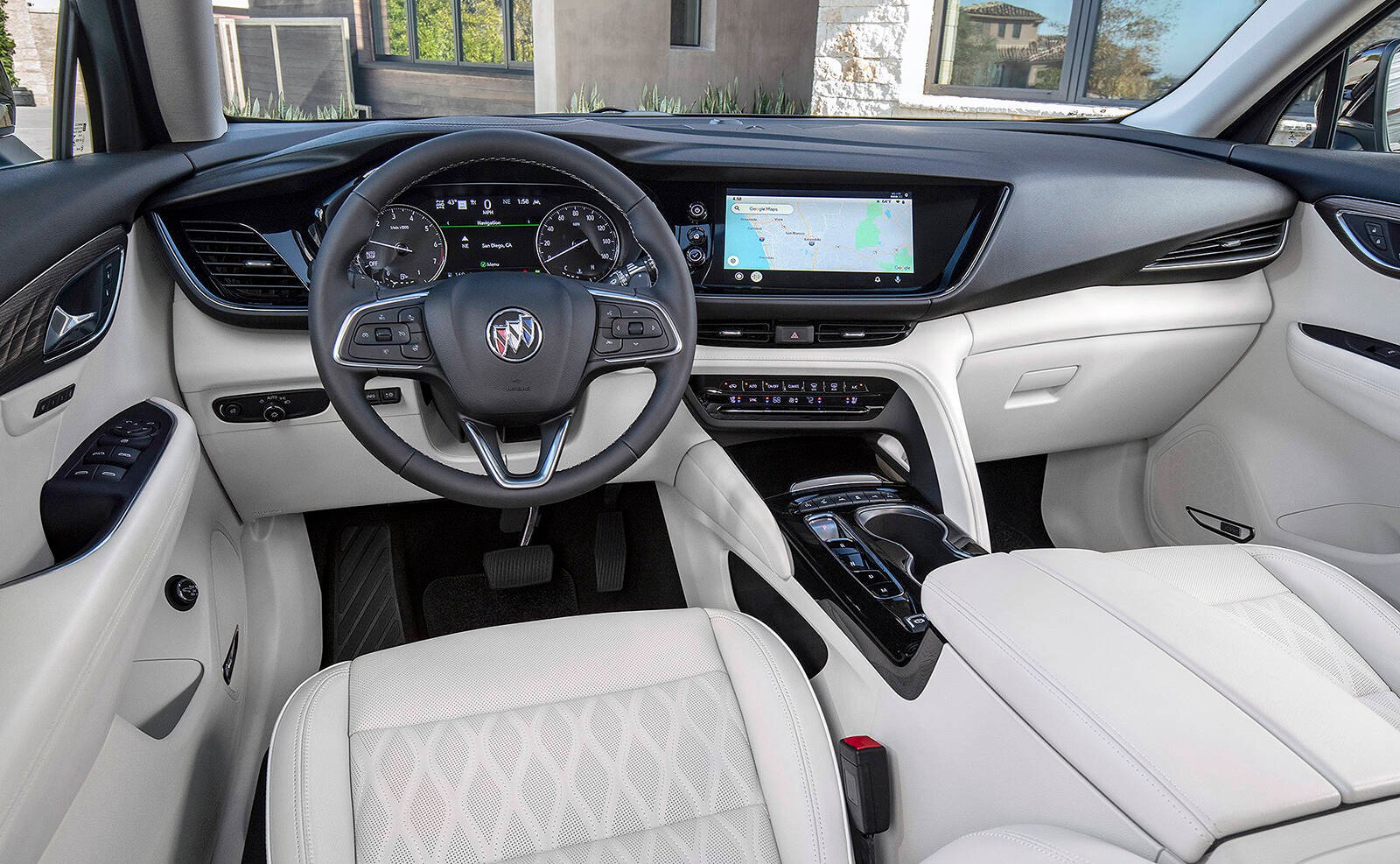 Meet the 2021 Buick Envision - Vernon Morning Star 2 The redesigned interior replaces the shifter handle with a row of buttons, and the touch-screens are more neatly integrated into the dash. This is the inside of the new Avenir trim, but its similar to that of the lower trims. PHOTO: GENERAL MOTORS