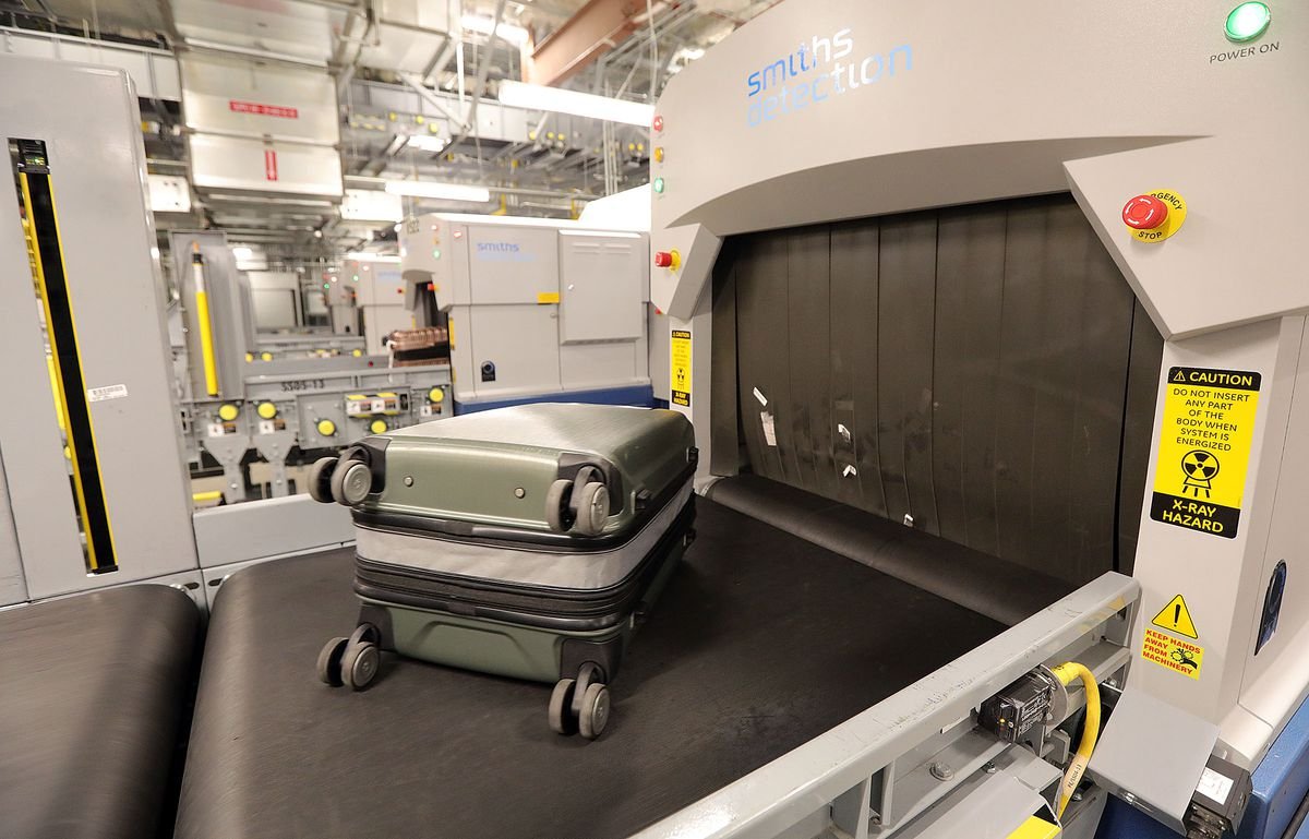 The day that changed air travel forever 3 A checked bag moves into a CT scanner at the airport in Salt Lake City on Thursday, Aug. 26, 2021.The scanners are part of increased security measures implemented after the Sept. 11 attack.
