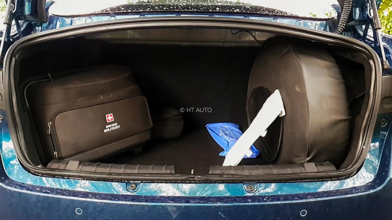Tigor EV has a boot of 316 litres but a vertically placed spare tyre eats into space. One can choose to keep the spare tyre at home because Tata Motors is offering an air-refilling kit/can to quickly repair punctures. Tigor EV has a boot of 316 litres but a vertically placed spare tyre eats into space. One can choose to keep the spare tyre at home because Tata Motors is offering an air-refilling kit/can to quickly repair punctures.