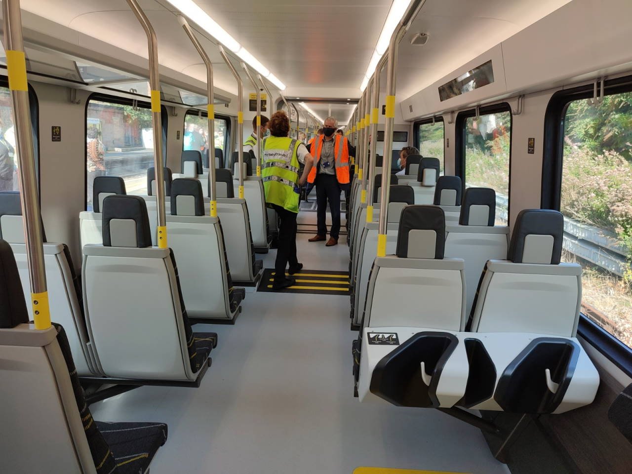 Merseyrail opens doors to Class 777 train at Birkenhead North. 3 Merseyrail Class 777 at Birkenhead North