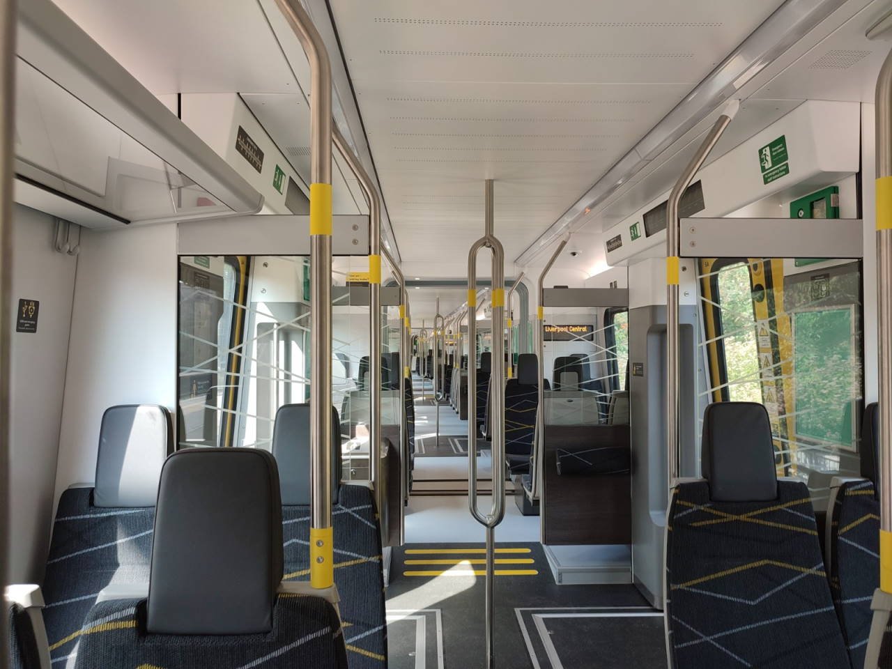 Merseyrail opens doors to Class 777 train at Birkenhead North. 9 Merseyrail Class 777 at Birkenhead North