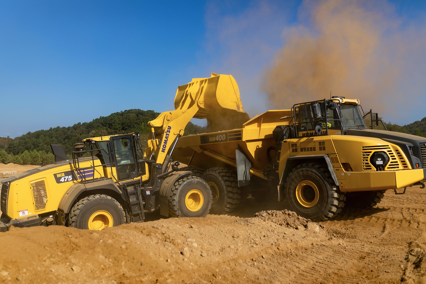 Wheel loaders up the ante on versatility, technology 5 Komatsu WA475-10 wheel loader loading truck