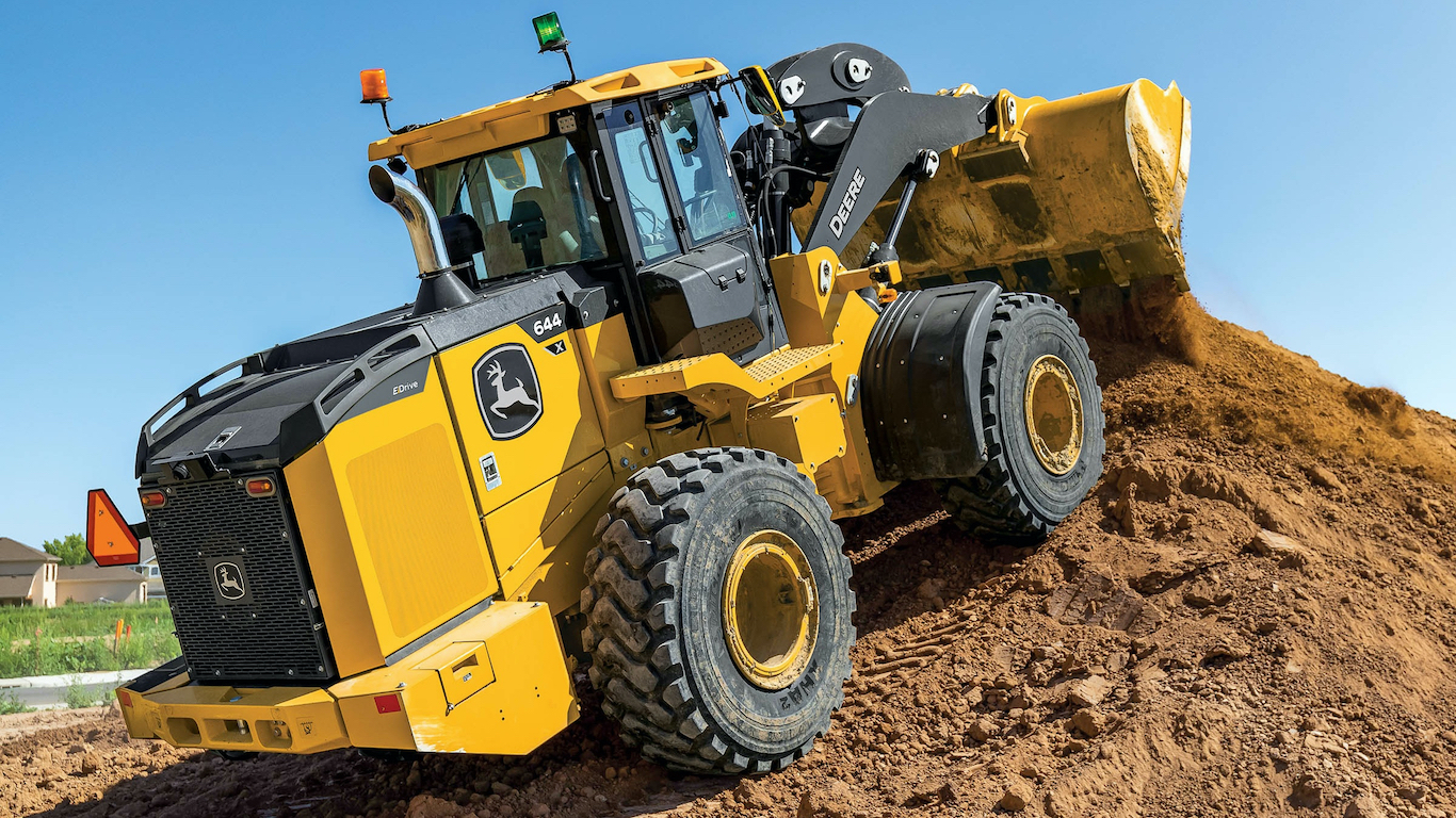 Wheel loaders up the ante on versatility, technology 4 John Deere 644 X-tier wheel loader dirt pile