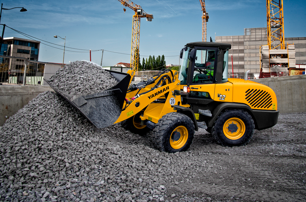 Wheel loaders up the ante on versatility, technology 12 Yanmar V12 wheel loader rock pile
